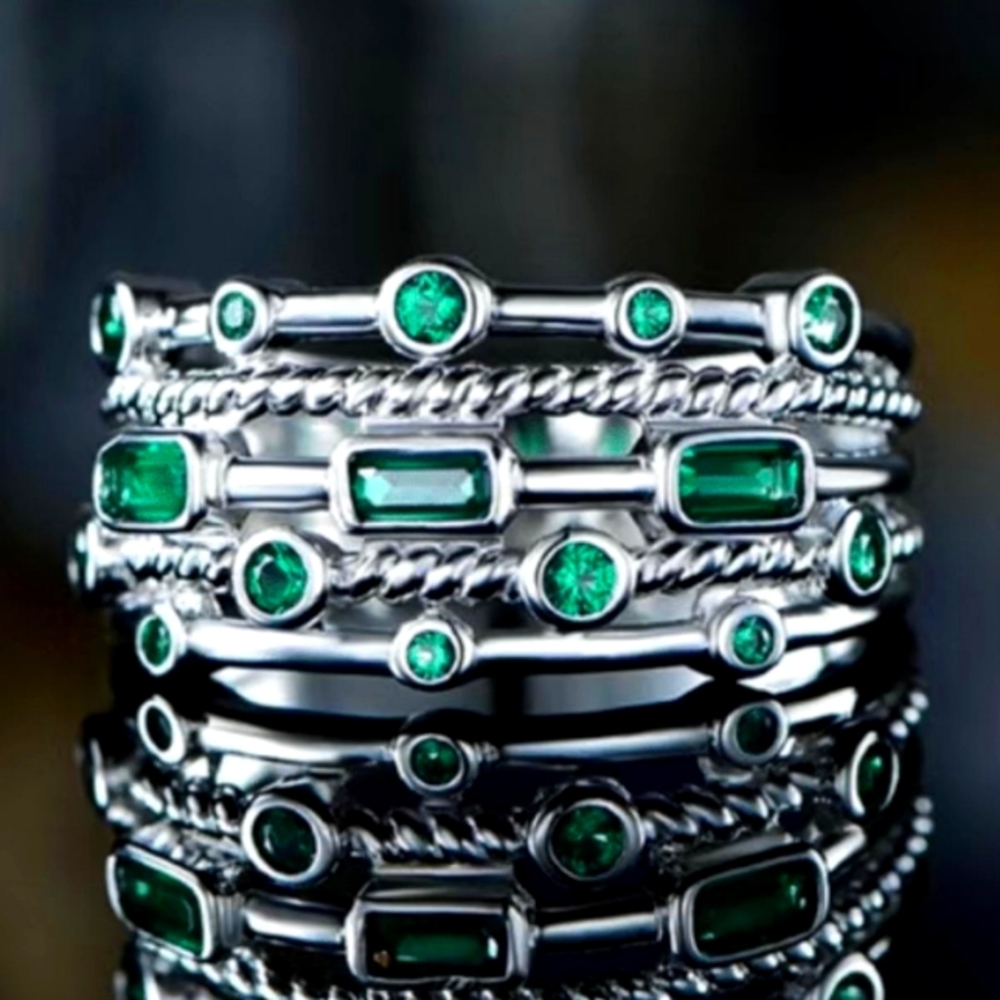 Ring with green stones